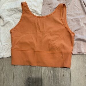 Lululemon tanks size 12. Very loved. Plenty of life to give.